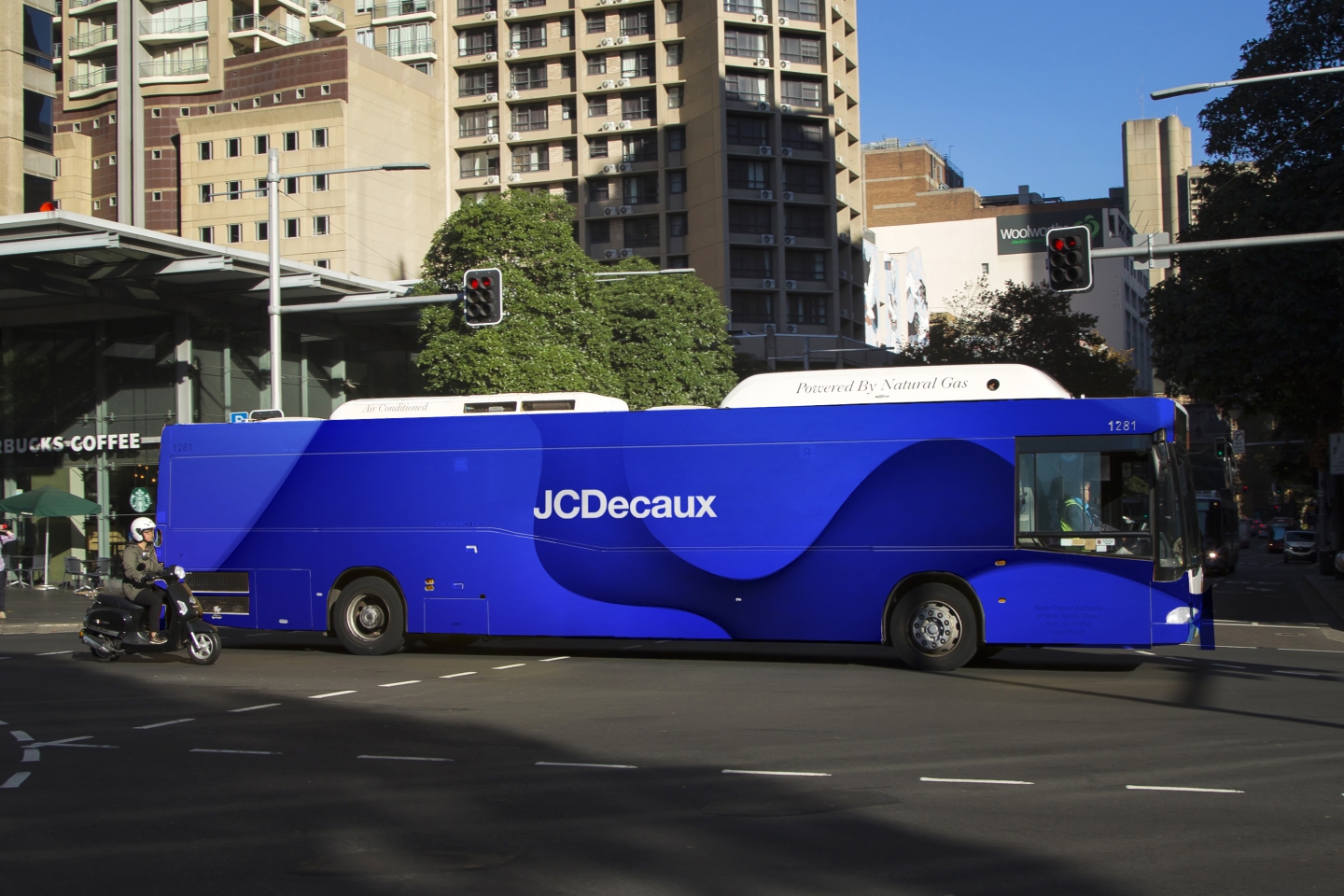 JCDeacux Transit bus wrap advertising