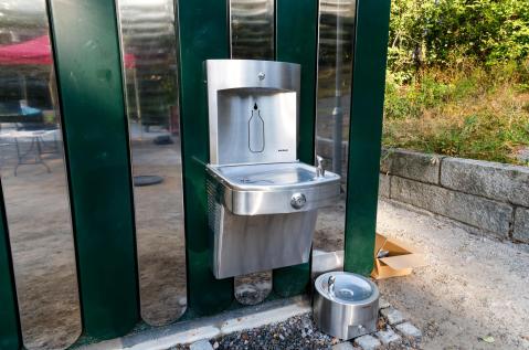 Front view of JCDecaux inclusive self-cleaning toilet in Lötsjöparken, designed to welcome dogs and their owners with free 24/7 access