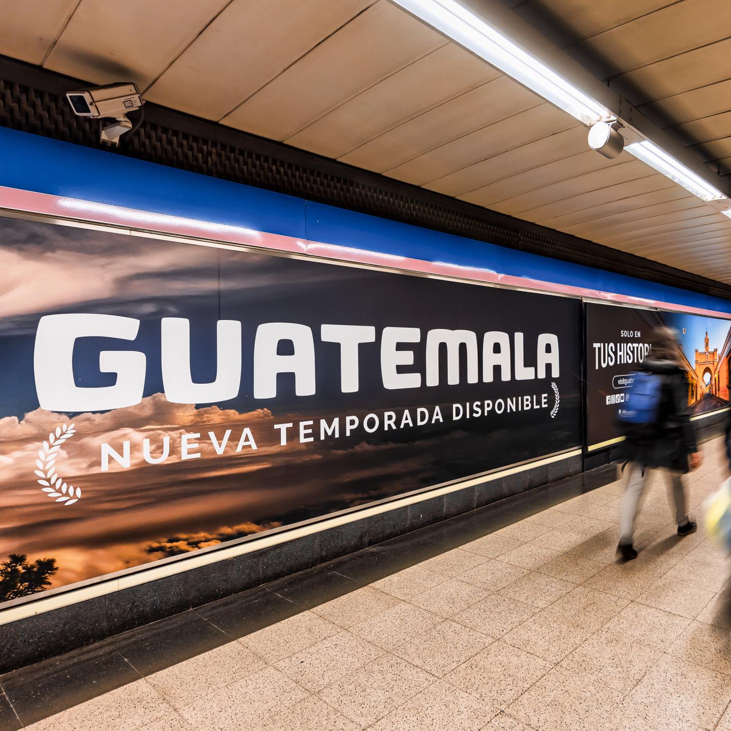 Immersive out‑of‑home advertising for Visit Guatemala, with JCDecaux Spain wrapping station walls in vibrant Central American imagery.