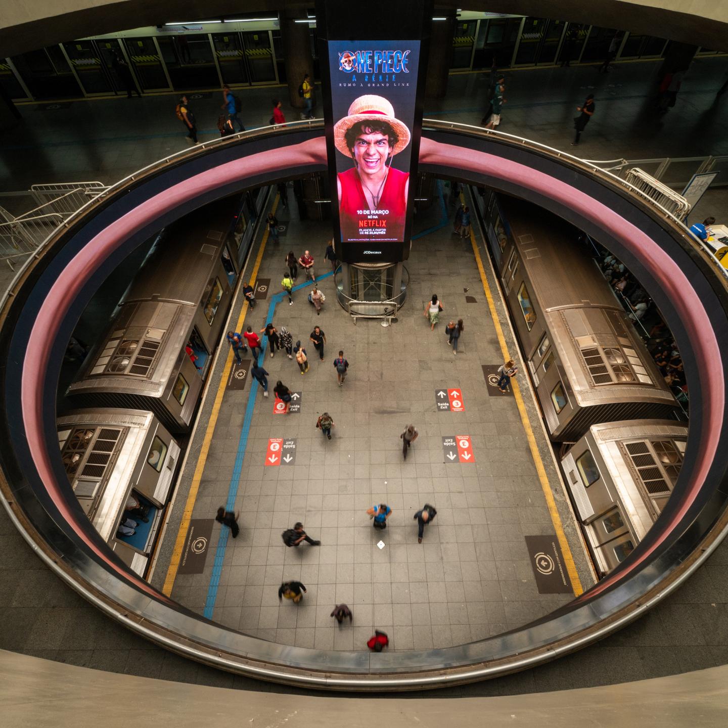 Wide shot of JCDecaux and Netflix One Piece campaign in São Paulo metro, transforming the station into an immersive brand experience.