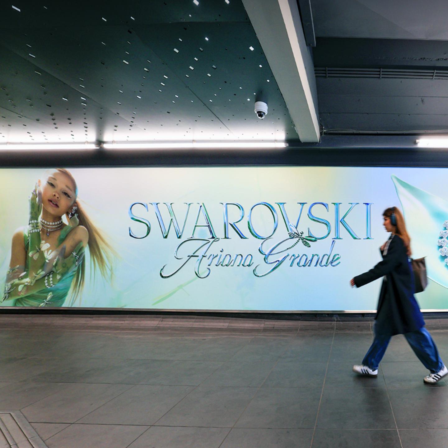 Intricate crystal dragonflies and graceful butterflies decorating the station walls for the Ariana Grande capsule collection launch.