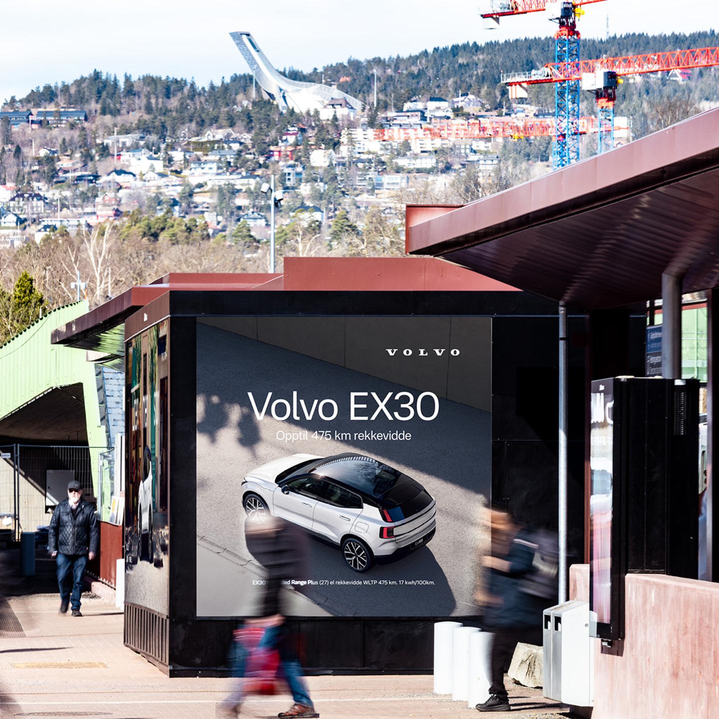 Professional advertising display for the all-electric Volvo EX30 SUV in an urban environment
