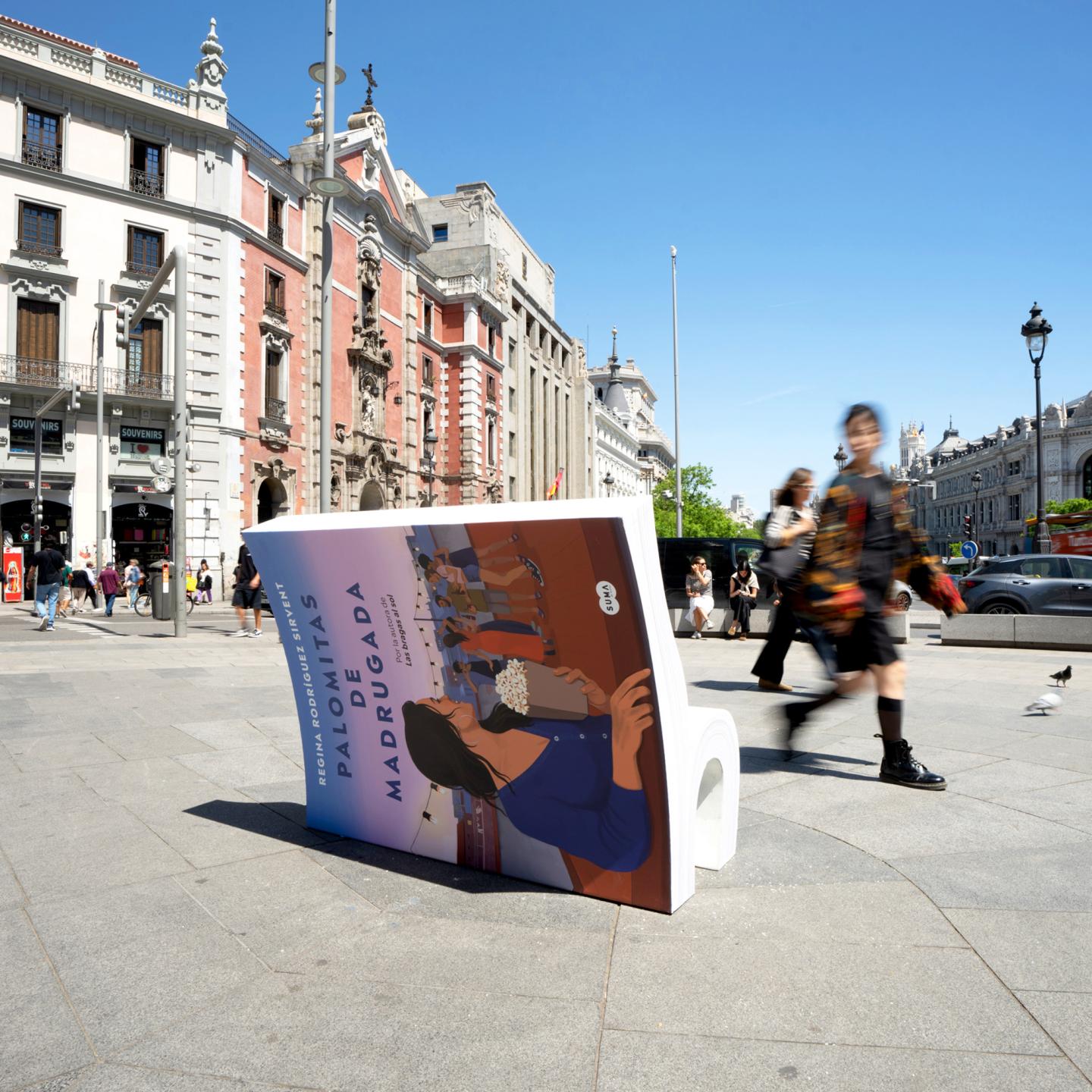 Urban scene showing several JCDecaux book benches