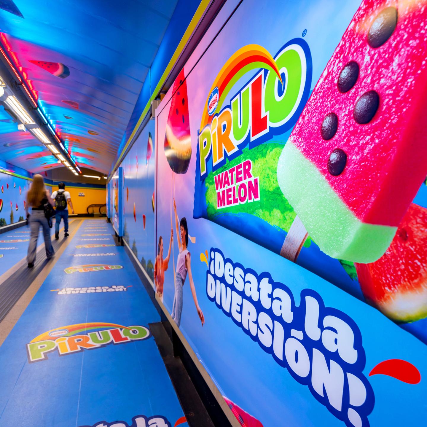 JCDecaux Spain installation at Callao station featuring Pirulo Watermelon visuals, scented corridors and sunset-inspired lighting.