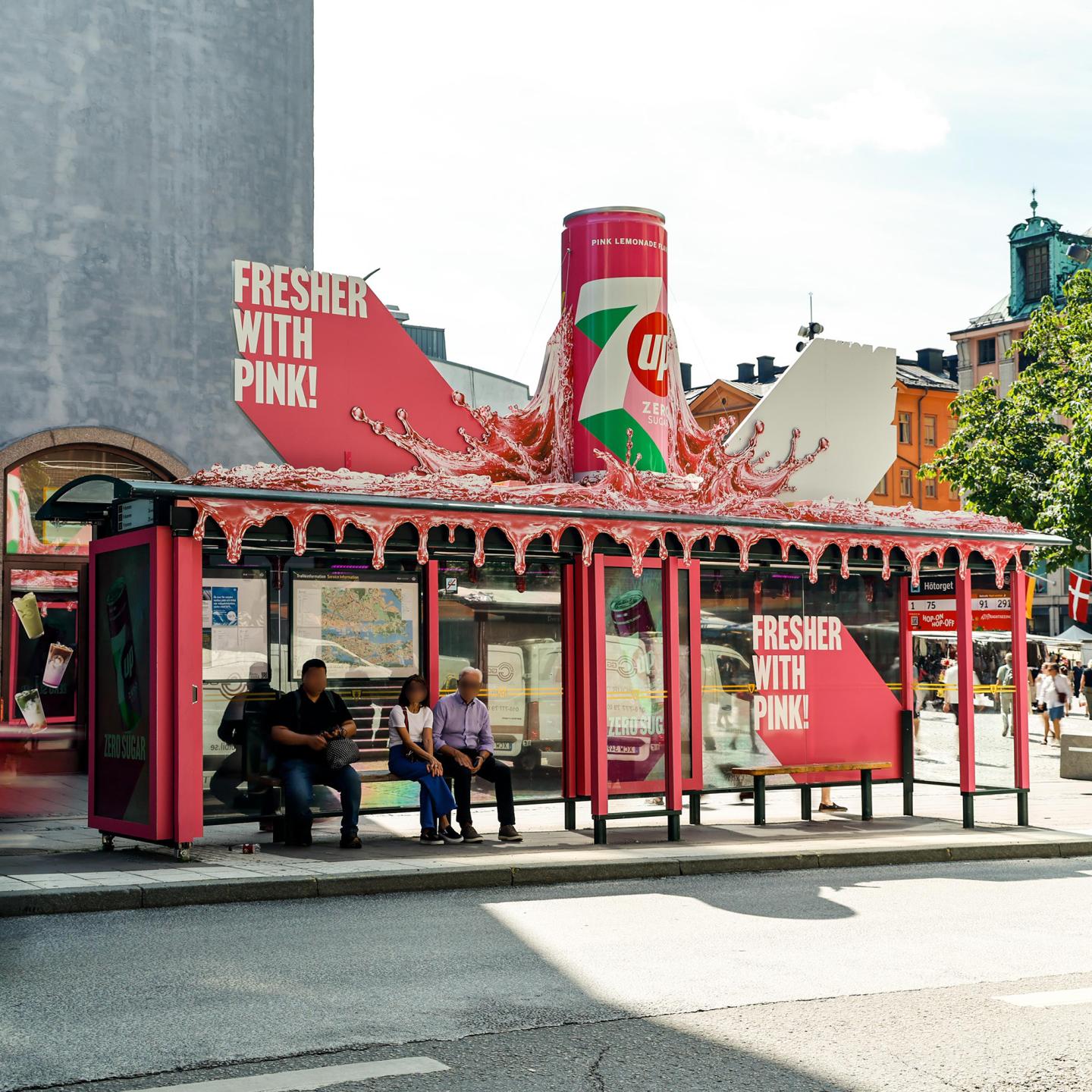 Street-level view of a JCDecaux bus shelter in Sweden transformed for 7Up Zero Sugar Pink Lemonade