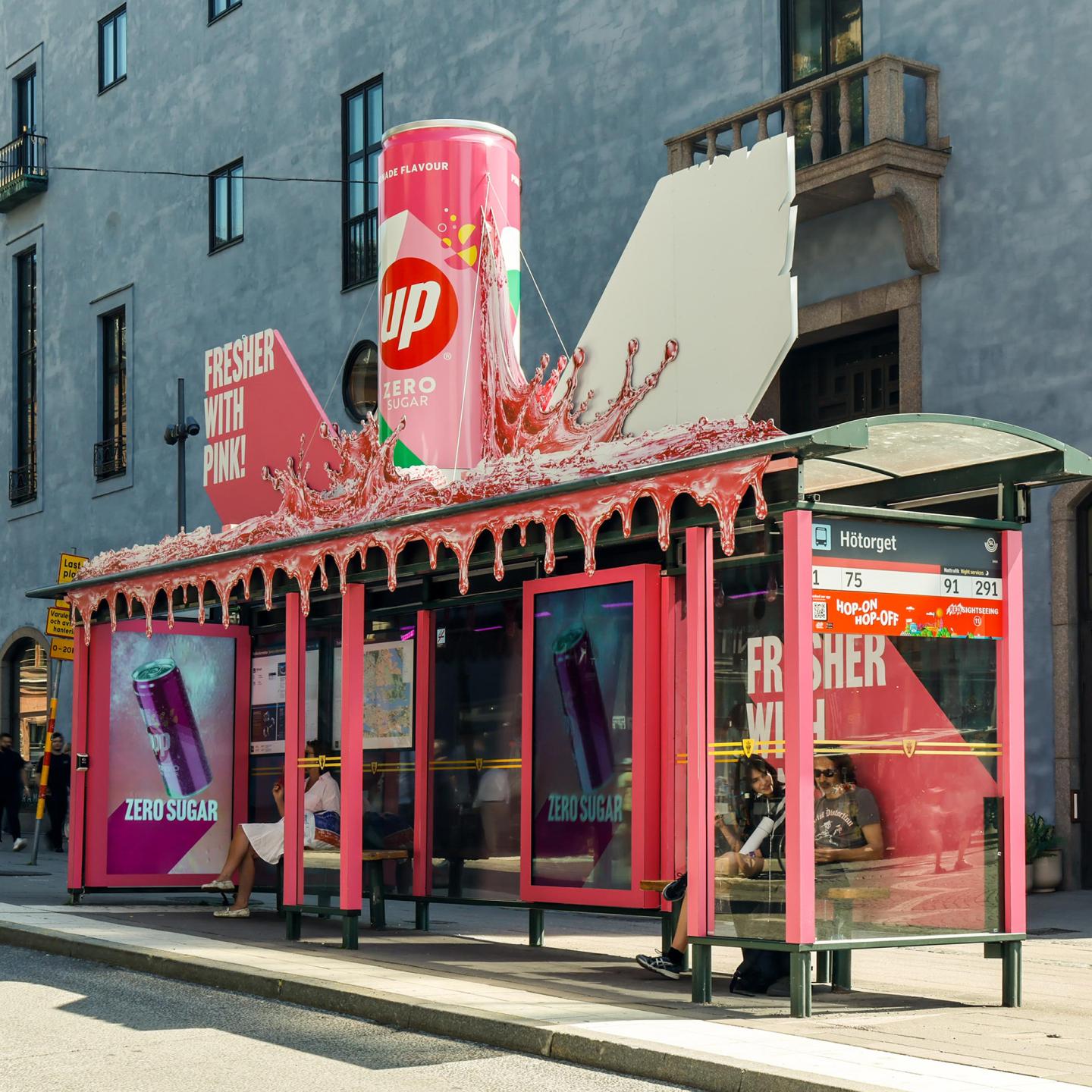 JCDecaux bus shelter in Stockholm wrapped in bright pink 7Up Zero Sugar Pink Lemonade branding