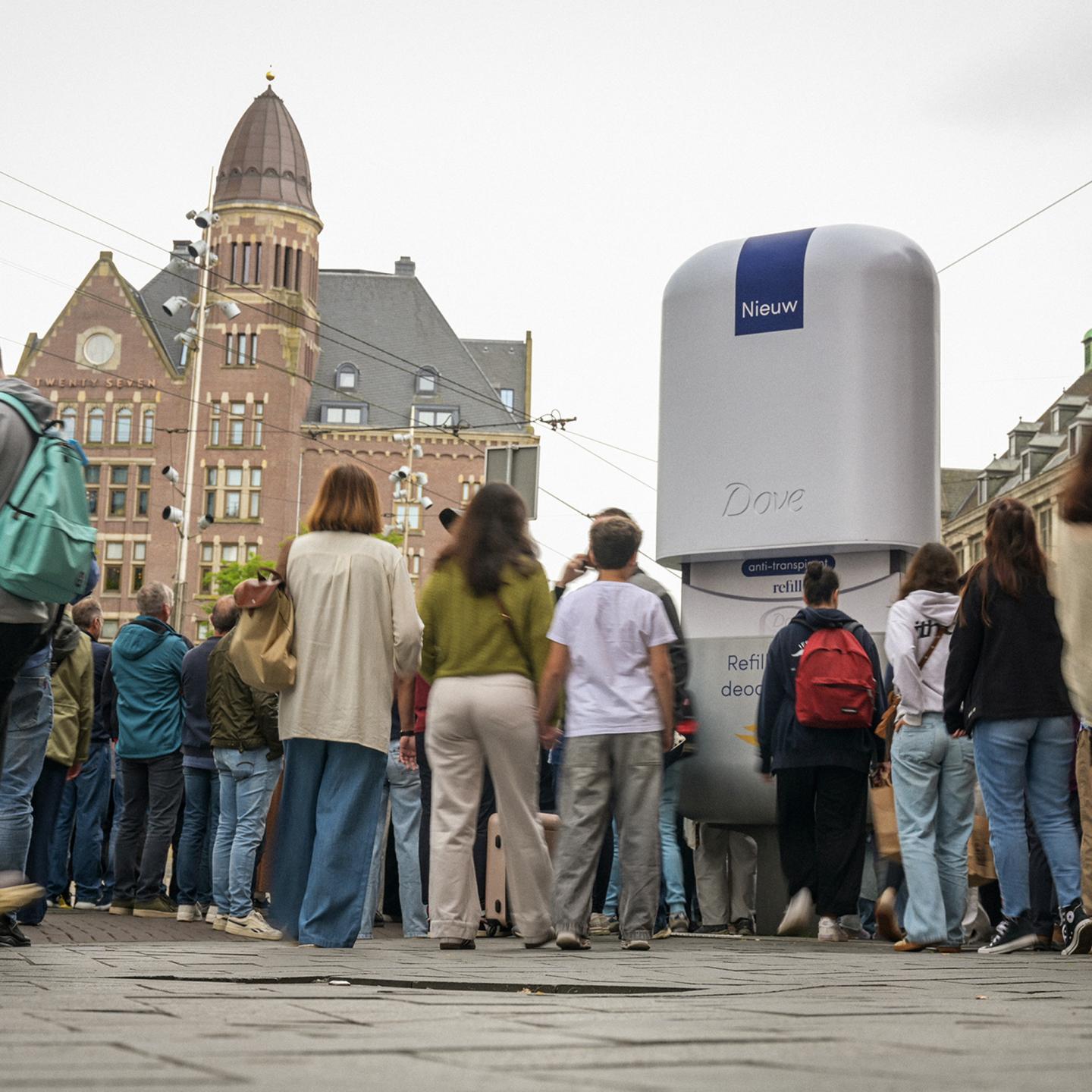 Close-up of JCDecaux street furniture featuring a large Dove deodorant installation, highlighting the refill concept in the centre of Amsterdam.