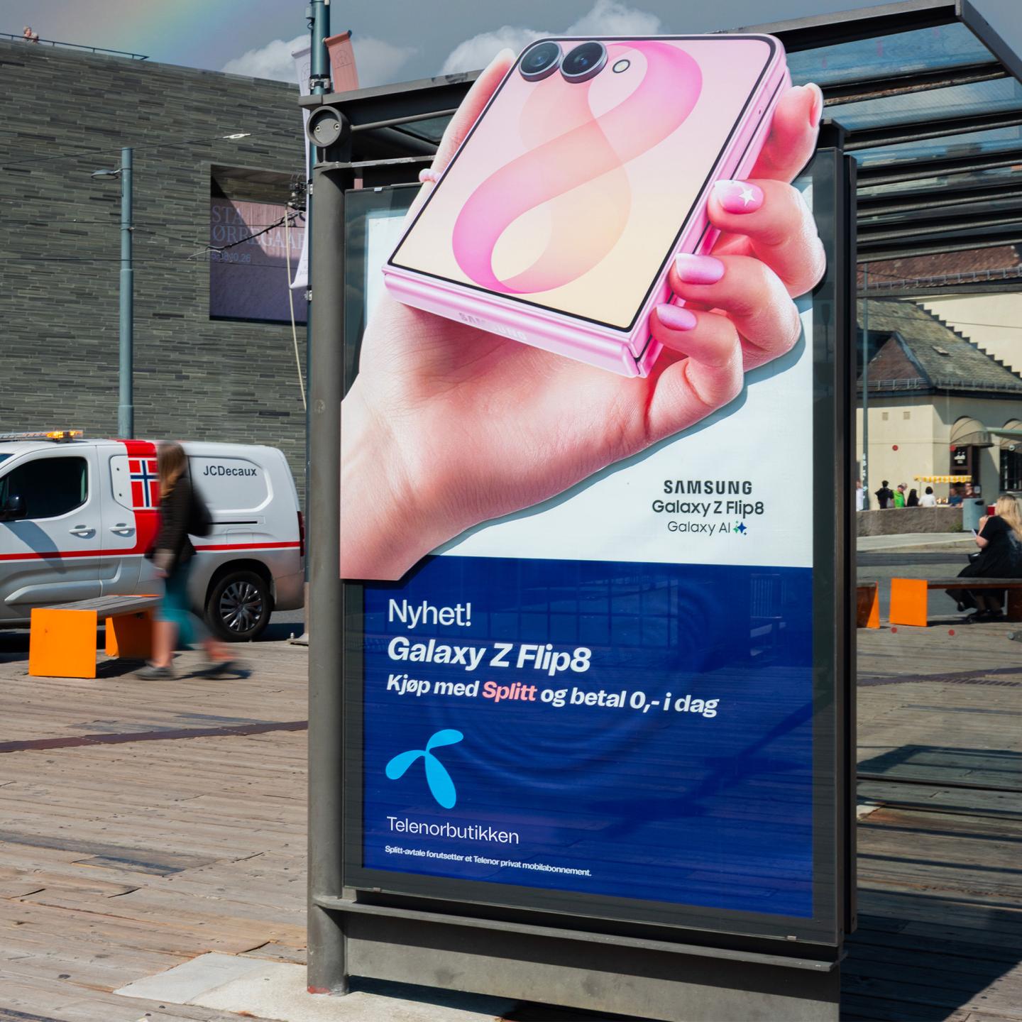 A high-impact creative out-of-home advertising panel from JCDecaux featuring custom cutout effects for the Samsung Z Fold8 in central Oslo.