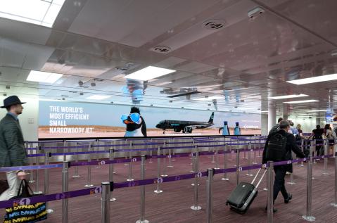 Extime JCDecaux Airport - Embraer