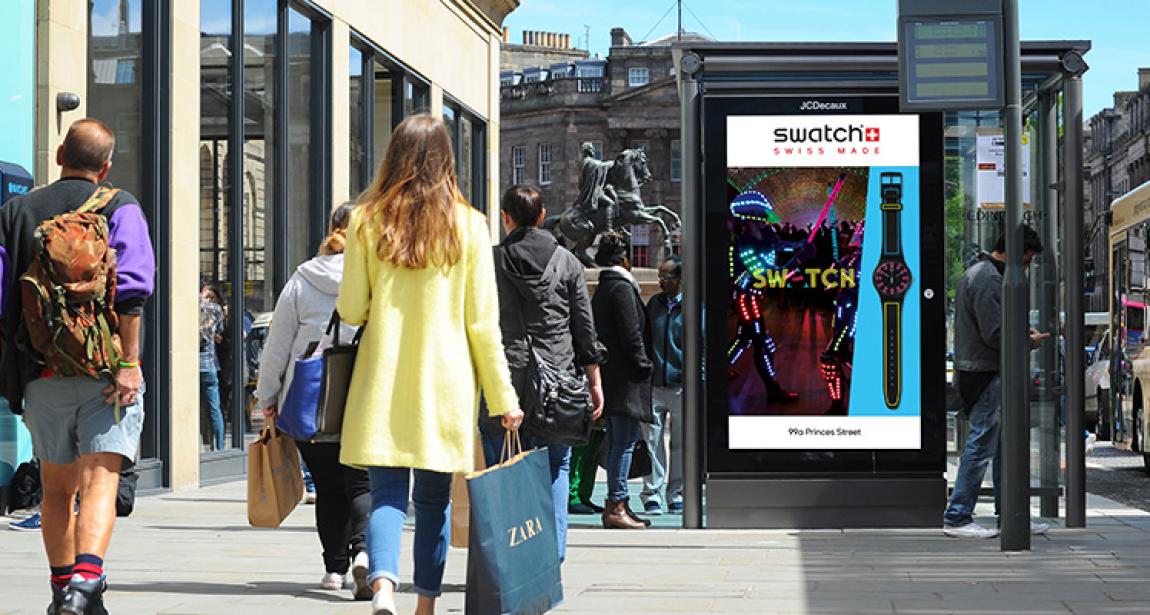 Swatch bus stop advertising in Edinburgh on Princes Street