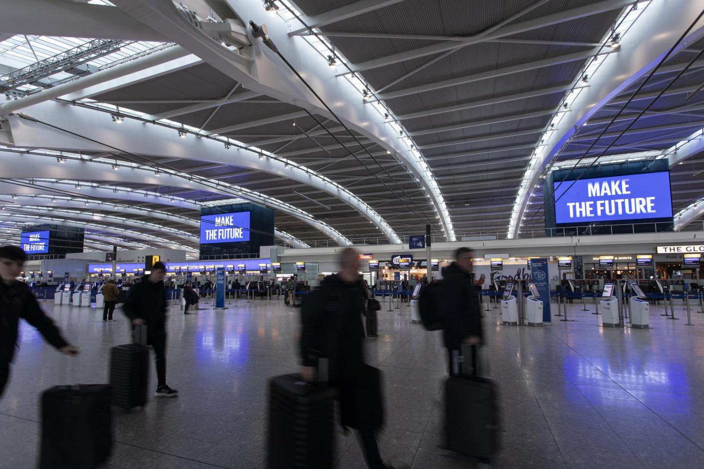 Multiple digital billboards in Heathrow Terminal 5 T5 