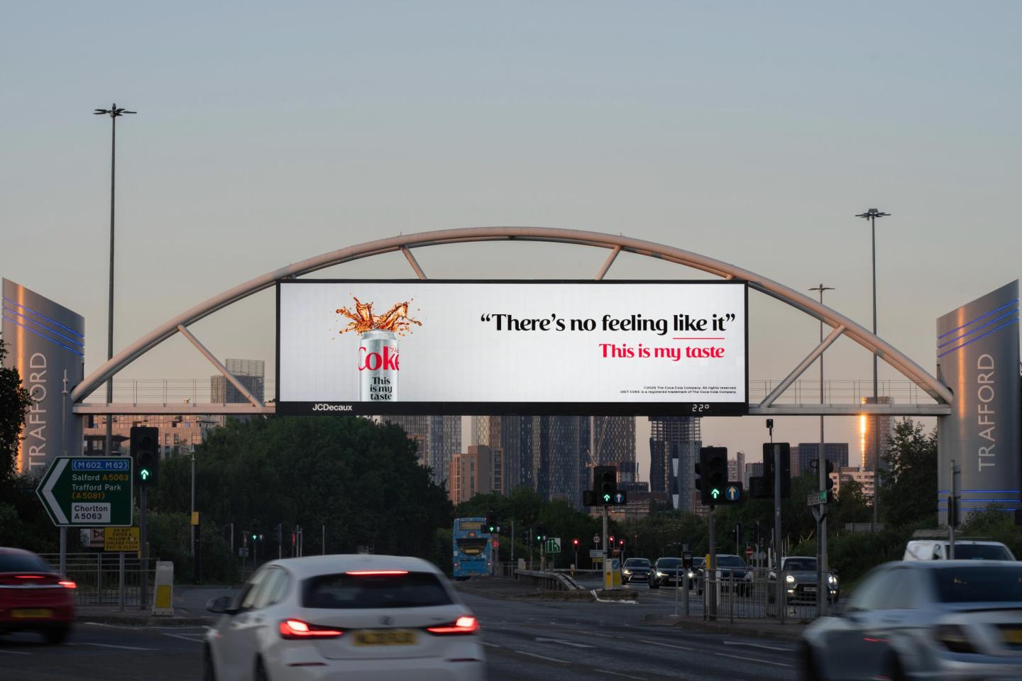A billboard over a major road in Manchester with an ad campaign by Diet Coke