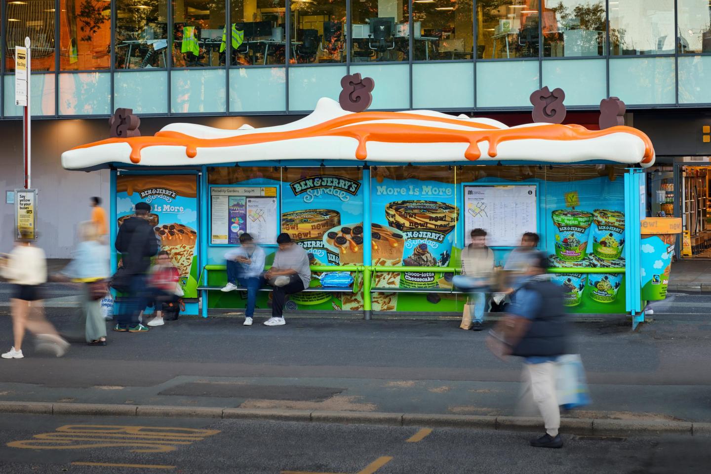 a bus shelter turned into an Out-of-Home advertisement for ben n jerry ice cream