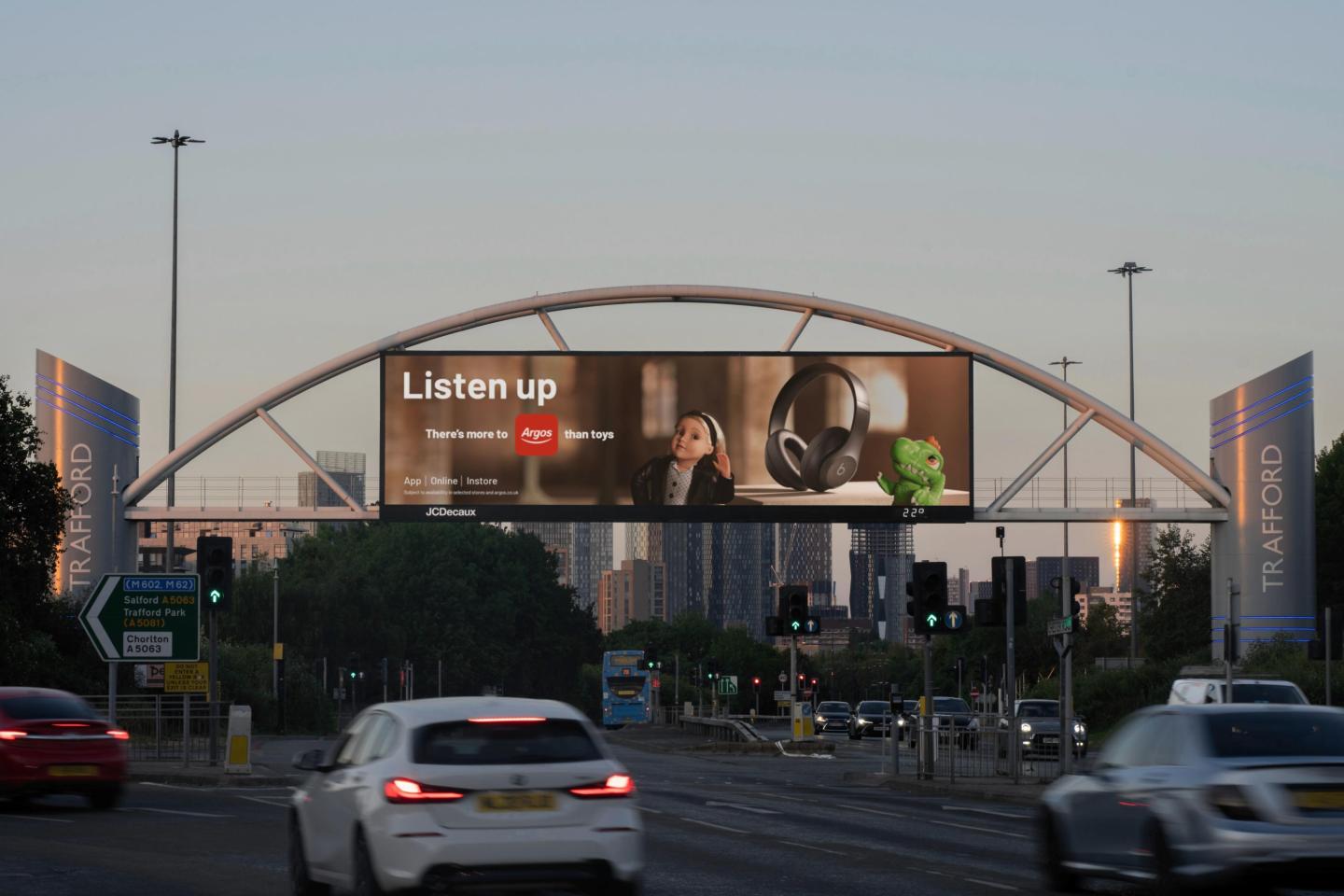 a billboard adverting campaign for Argos above a main road in Trafford, Manchester