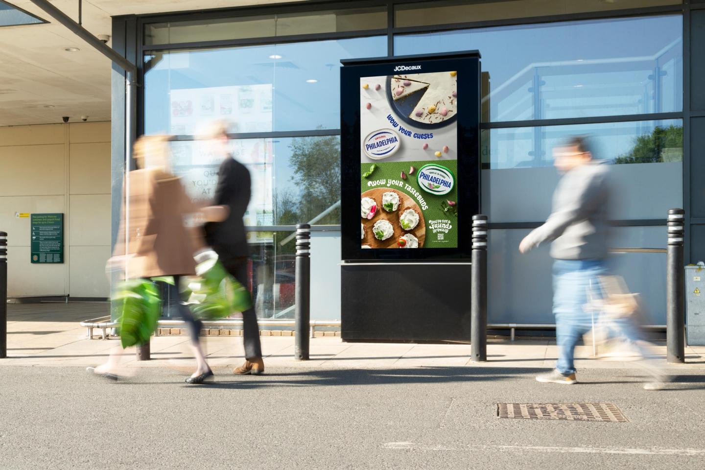 an out-of-home advertising campaign for Philadelphia at a Waitrose supermarket