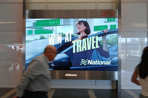 Large digital spectacular at DFW shows Enterprise car rental advertising