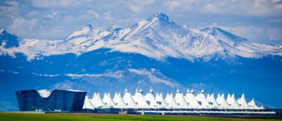 Exterior of Denver International Airport against a backdrop of Colorado mountains, where JCDecaux will be the official advertising partner for the next decade.