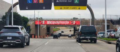 Coca Cola takes over the entryway to IAH with airport exterior advertising