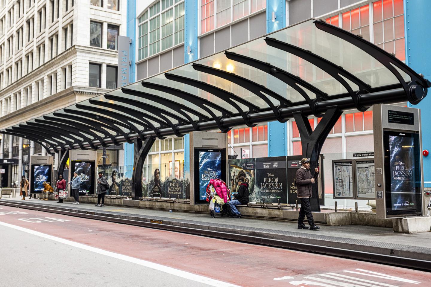 Disney+ Percy Jackson OOH Advertising Campaign on JCDecaux Premium Synced Bus Shelter in Chicago