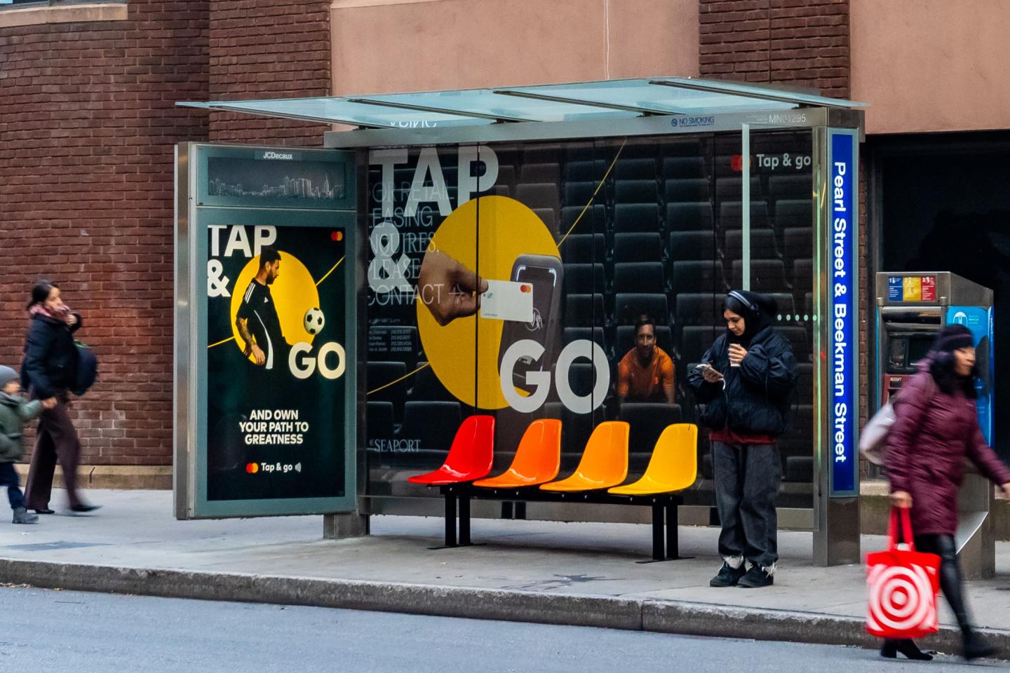 Mastercard OOH Advertising Campaign on JCDecaux Static Bus Shelter in NYC