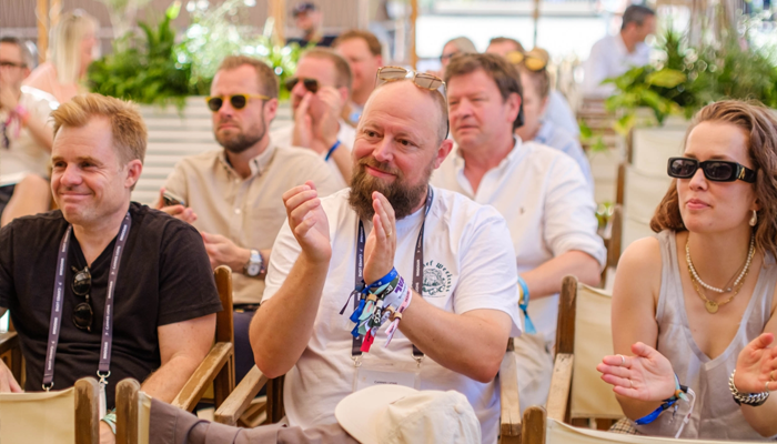 Audience at JCDecaux's programmatic insights presentation at Cannes Lyons 2025