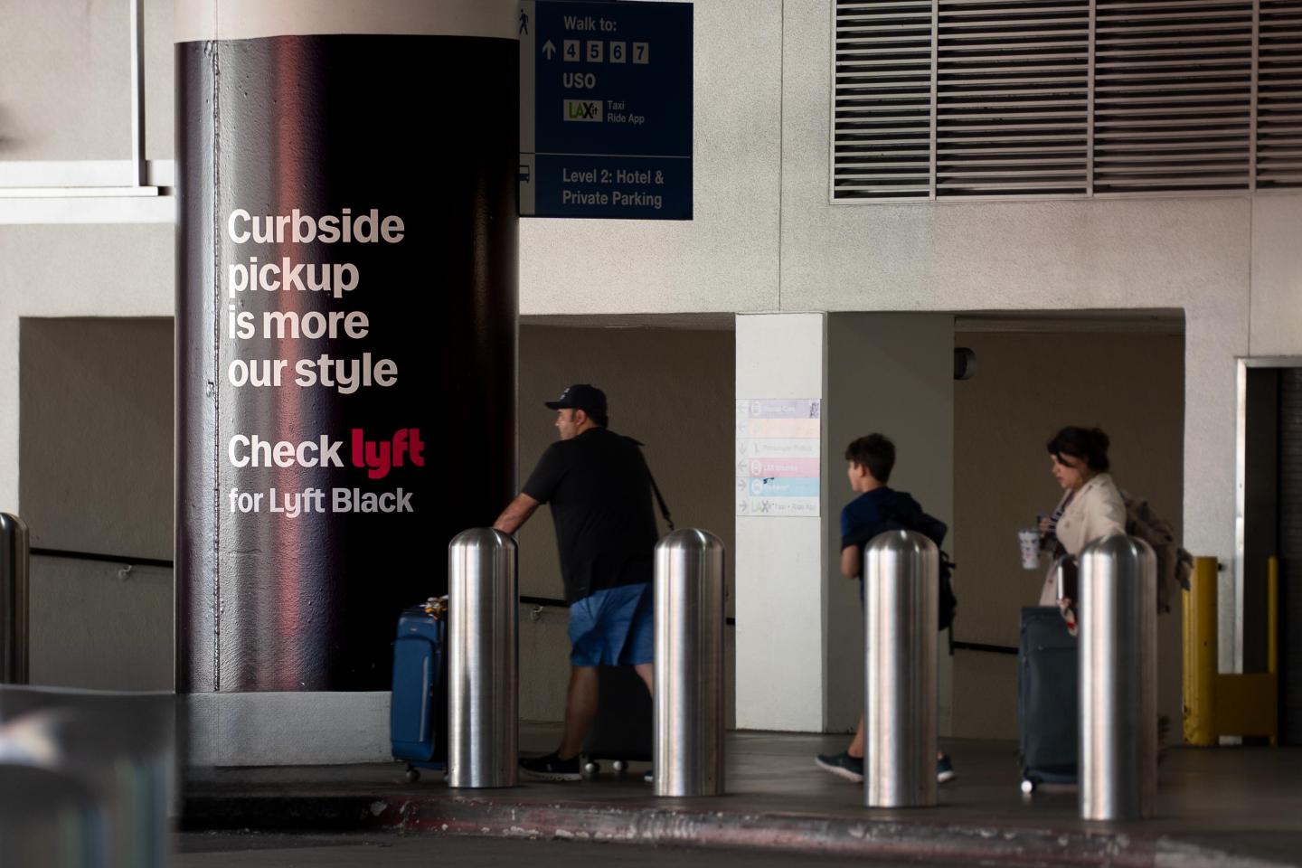 Lyft advertises in the rideshare zone at LAX on exterior columns